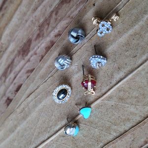 Set of 8 vintage single stud earrings, some designer